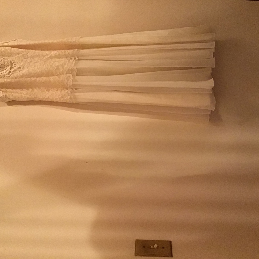 Ivory evening dress.